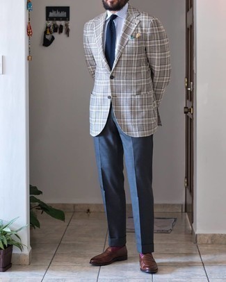 Violet Socks Dressy Outfits For Men: A grey plaid blazer and violet socks are among the crucial pieces in any modern man's functional casual closet. Tap into some David Gandy stylishness and smarten up your look with brown leather loafers.