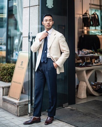 Beige Blazer Outfits For Men: Pairing a beige blazer and navy dress pants will prove your sartorial prowess. Our favorite of a ton of ways to round off this look is with dark brown leather oxford shoes.