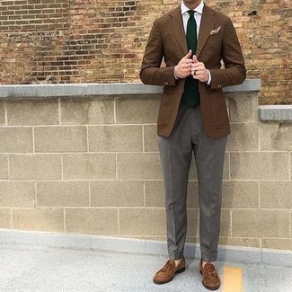 Dark Green Tie Outfits For Men: For a look that's truly Kingsman-worthy, opt for a brown check blazer and a dark green tie. Introduce brown suede tassel loafers to this getup and off you go looking boss.