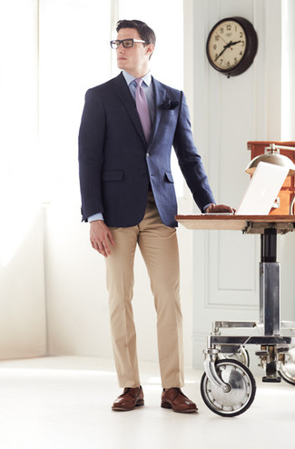 Consider pairing a navy blazer with khaki dress pants for truly stylish attire. If not sure as to what to wear in the footwear department, go with a pair of brown leather derby shoes.