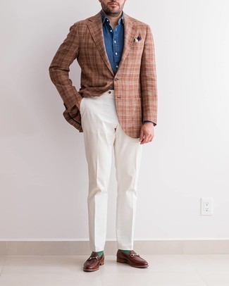 Brown Leather Loafers Outfits For Men: This combination of a tobacco plaid blazer and white dress pants is really sharp and provides a clean and chic look. Let your outfit coordination expertise truly shine by finishing this look with brown leather loafers.