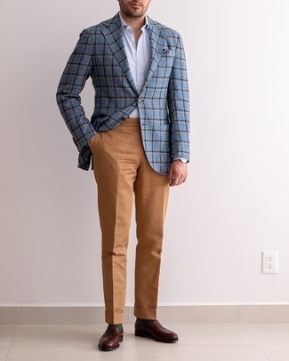 Light Blue Dress Shirt Outfits For Men: This polished combo of a light blue dress shirt and tobacco dress pants is undoubtedly a statement-maker. Let your styling credentials truly shine by finishing off your look with a pair of dark brown leather loafers.