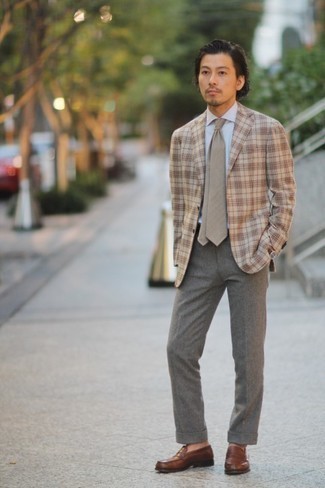 Brown Leather Loafers Outfits For Men: Definitive proof that a beige plaid blazer and grey dress pants look awesome when worn together in a classy outfit for a modern guy. We love how a pair of brown leather loafers makes this look whole.