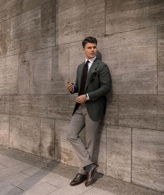 Olive Blazer Outfits For Men: For a look that's sophisticated and GQ-worthy, choose an olive blazer and grey dress pants. Let your outfit coordination skills really shine by rounding off this ensemble with dark brown leather loafers.