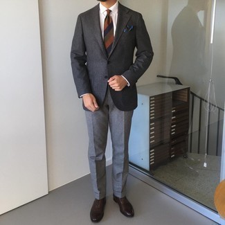 Multi colored Horizontal Striped Tie Outfits For Men: Parade your sophisticated self by wearing a charcoal wool blazer and a multi colored horizontal striped tie. For maximum style effect, complete this ensemble with a pair of dark brown leather oxford shoes.
