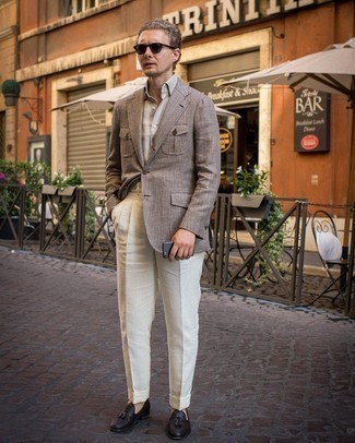 Dark Brown Herringbone Wool Blazer Dressy Outfits For Men: Consider wearing a dark brown herringbone wool blazer and white dress pants if you're going for a proper, trendy outfit. For maximum fashion effect, add a pair of dark brown woven leather tassel loafers to the mix.