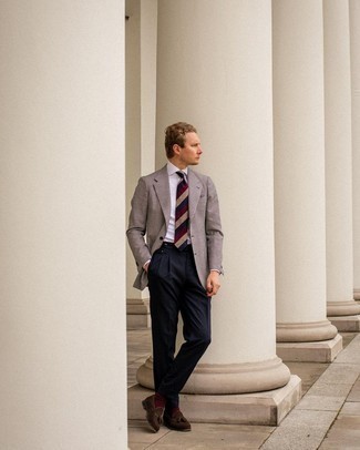 Grey Check Blazer Outfits For Men: Pair a grey check blazer with navy dress pants to look like a complete gent. Complete this getup with dark brown suede tassel loafers and the whole ensemble will come together perfectly.