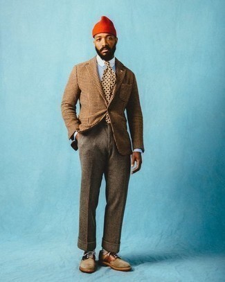 Orange Beanie Outfits For Men: Fashionable and practical, this combination of a brown houndstooth wool blazer and an orange beanie provides wonderful styling opportunities. For something more on the smart end to finish this ensemble, introduce a pair of tan suede derby shoes to this ensemble.