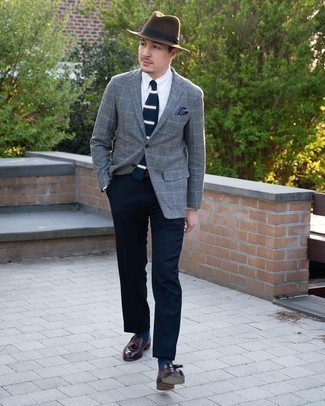 Navy Dress Pants Outfits For Men: We're loving how this pairing of a grey check blazer and navy dress pants immediately makes a man look sharp and elegant. If you're puzzled as to how to finish, a pair of dark brown leather tassel loafers is a winning option.