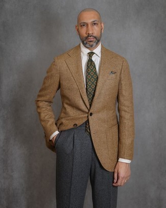 Charcoal Wool Dress Pants Outfits For Men: Teaming a tan herringbone wool blazer and charcoal wool dress pants is a surefire way to inject your day-to-day wardrobe with some masculine refinement.