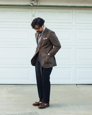 Dark Brown Blazer Outfits For Men: This pairing of a dark brown blazer and navy dress pants oozes polished elegance. Add dark brown suede tassel loafers to your getup and you're all set looking smashing.