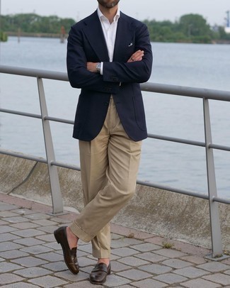 Khaki Dress Pants Outfits For Men: You'll be surprised at how extremely easy it is to get dressed like this. Just a navy blazer worn with khaki dress pants. Dark brown leather loafers are a savvy pick to complete this look.