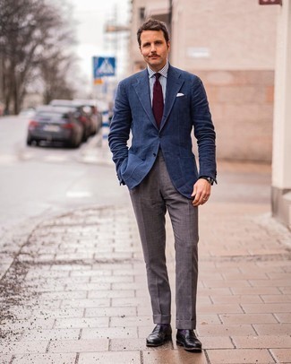 Navy Blazer Dressy Outfits For Men: A navy blazer and charcoal dress pants are a smart pairing that will get you the proper amount of attention. Let your outfit coordination chops really shine by complementing this look with a pair of black leather loafers.