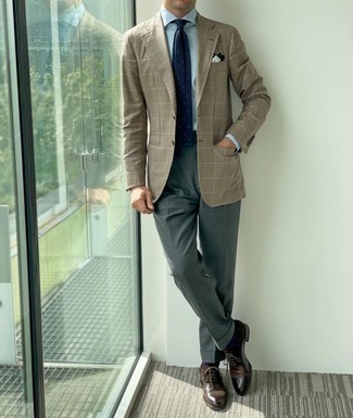 Violet Socks Outfits For Men: This combination of a tan houndstooth blazer and violet socks is impeccably stylish and yet it's relaxed and ready for anything. Rounding off with a pair of dark brown leather oxford shoes is the most effective way to introduce some extra flair to this outfit.