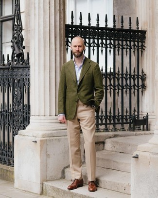 Dark Green Wool Blazer Outfits For Men: One of the classiest ways to style out such a timeless menswear piece as a dark green wool blazer is to team it with khaki dress pants. Look at how great this ensemble is completed with brown leather derby shoes.