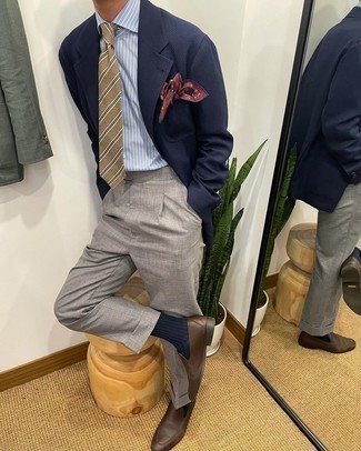 Navy Blazer Outfits For Men: You'll be amazed at how easy it is to get dressed this way. Just a navy blazer and grey dress pants. On the footwear front, this look is rounded off perfectly with dark brown leather loafers.