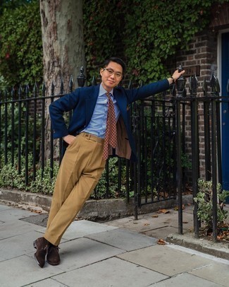 Men's Outfits 2021: A navy blazer and khaki dress pants are absolute mainstays if you're figuring out an elegant wardrobe that matches up to the highest sartorial standards. Rounding off with dark brown suede desert boots is a fail-safe way to bring a mellow touch to this ensemble.