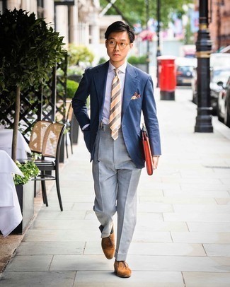 500+ Dressy Outfits For Men: You're looking at the hard proof that a navy vertical striped blazer and grey dress pants are amazing when worn together in a classy ensemble for today's gentleman. Want to break out of the mold? Then why not add brown suede oxford shoes to the mix?