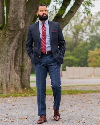 Navy Blazer Outfits For Men: This is indisputable proof that a navy blazer and navy plaid dress pants look amazing together in a refined look for today's man. Finishing with a pair of burgundy leather oxford shoes is a surefire way to bring some extra depth to your look.