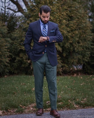Navy Blazer Outfits For Men: This combination of a navy blazer and dark green dress pants is truly dapper and creates instant appeal. For something more on the daring side to complement this outfit, add a pair of dark brown leather brogues to the equation.
