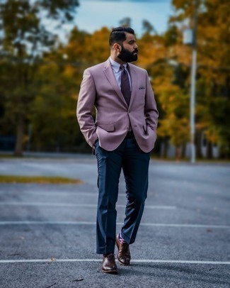 Navy Pocket Square Outfits: This bold casual combo of a purple blazer and a navy pocket square is extremely versatile and really apt for whatever the day throws at you. Go the extra mile and jazz up your look by finishing off with a pair of dark brown leather brogues.