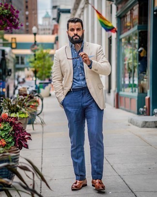 Navy Vertical Striped Dress Pants Outfits For Men: Combining a beige blazer and navy vertical striped dress pants is a guaranteed way to infuse your day-to-day collection with some rugged sophistication. If you're on the fence about how to finish, a pair of brown leather tassel loafers is a fail-safe option.