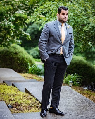 Monks Outfits In Their 30s: Go all out in a grey wool blazer and black dress pants. Monks are a good choice to complete your look. A look like this will help any man in his 30s outshine his peers.