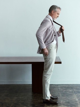 White Dress Shirt Outfits For Men: This smart combination of a white dress shirt and grey jeans is super easy to pull together without a second thought, helping you look amazing and ready for anything without spending too much time going through your wardrobe. Dark brown leather loafers will give a sleeker twist to your ensemble.