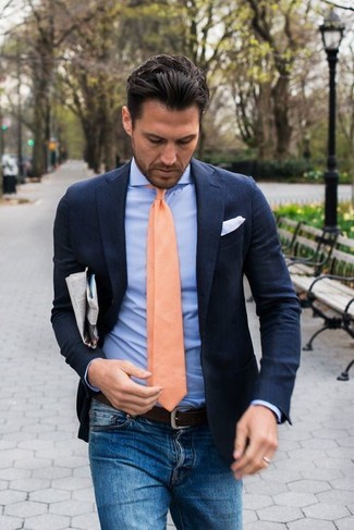 When the situation calls for a classy yet knockout outfit, consider pairing a navy linen blazer with blue jeans.