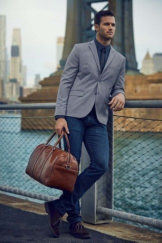 Tobacco Leather Duffle Bag Outfits For Men: Consider teaming a grey blazer with a tobacco leather duffle bag for a laid-back outfit with a twist. Dark brown suede desert boots will infuse an added touch of polish into an otherwise utilitarian ensemble.