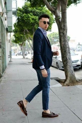 White Dress Shirt with Navy Jeans Smart Casual Outfits For Men: This combo of a white dress shirt and navy jeans looks put together and makes you look infinitely cooler. Our favorite of an endless number of ways to complete this ensemble is a pair of dark brown leather tassel loafers.