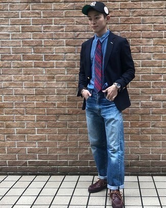 Blue Dress Shirt Outfits For Men: A blue dress shirt and blue jeans make for the ultimate casually sleek outfit. Add a pair of burgundy leather boat shoes to your look to loosen things up.