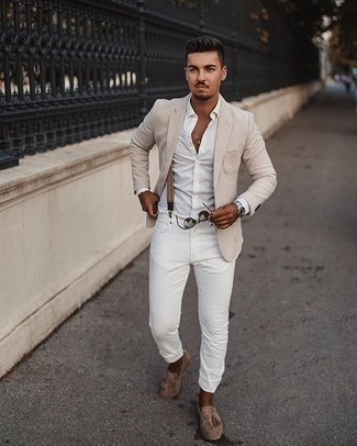 Tan Fringe Suede Loafers Outfits For Men: Wear a beige blazer and white jeans and you'll pull together a sleek and refined menswear style. To bring a bit of classiness to your getup, throw in a pair of tan fringe suede loafers.