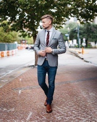 Grey Blazer Smart Casual Outfits For Men: Pair a grey blazer with navy jeans and you'll exude manly refinement and class. Introduce a pair of brown leather derby shoes to the mix for an extra dose of style.