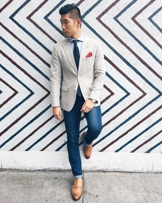 Grey Horizontal Striped Blazer Outfits For Men: Showcase your sartorial game in a grey horizontal striped blazer and navy jeans. Our favorite of a countless number of ways to round off this ensemble is a pair of tan leather double monks.