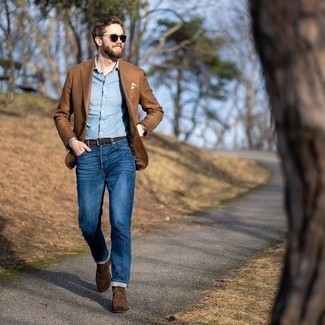 Brown Wool Blazer Outfits For Men: Inject personality into your current wardrobe with a brown wool blazer and navy jeans. Let your styling prowess really shine by rounding off this look with a pair of dark brown suede desert boots.