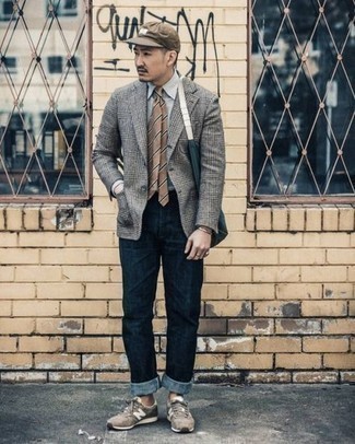Grey Plaid Blazer Outfits For Men: Choose a grey plaid blazer and navy jeans to feel fully confident and look trendy. To bring out the fun side of you, complement your ensemble with brown athletic shoes.