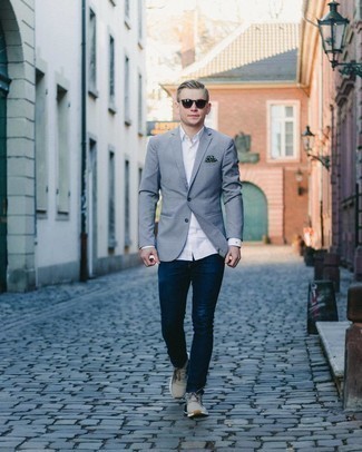 Navy Pocket Square Outfits: A grey blazer and a navy pocket square are great menswear staples to incorporate into your day-to-day arsenal. A pair of grey athletic shoes is a great pick to complement this getup.