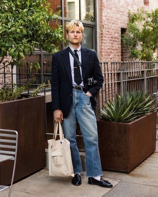 Blue Jeans Outfits For Men: This combo of a navy blazer and blue jeans is a mix between formal and casual. Why not add a pair of dark brown leather tassel loafers to this ensemble for an added touch of style?