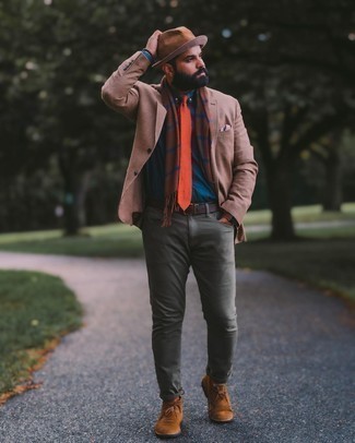 Tan Plaid Wool Blazer Outfits For Men: This pairing of a tan plaid wool blazer and dark green jeans is the ideal balance between fun and stylish. Introduce a pair of brown suede desert boots to the equation for extra style points.