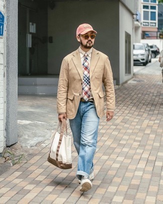 Pink Baseball Cap Outfits For Men: A tan cotton blazer and a pink baseball cap are a cool ensemble to add to your current casual lineup. You could perhaps get a little creative on the shoe front and class up this outfit by wearing a pair of white canvas low top sneakers.