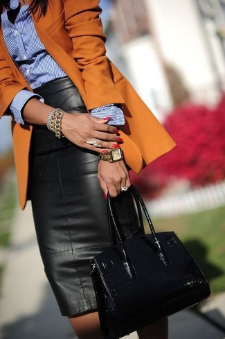 Orange Blazer Outfits For Women: Make an orange blazer and a black leather midi skirt your outfit choice for an off-duty and fashionable outfit.