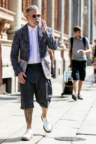 Such staples as a black and white tweed blazer and charcoal shorts are an easy way to introduce a sense of rugged refinement into your current casual fashion mix. You can get a little creative when it comes to shoes and smarten up your look by rocking a pair of white suede derby shoes.