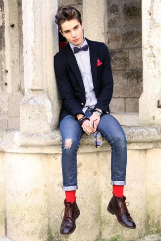 Black and White Polka Dot Bow-tie Outfits For Men: To put together a relaxed casual outfit with an edgy spin, team a navy blazer with a black and white polka dot bow-tie. For shoes, follow the classic route with a pair of dark brown leather casual boots.