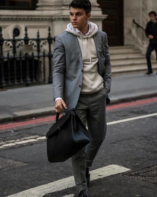 Black and White Leather Tote Bag Outfits For Men: We all seek practicality when it comes to styling, and this casual combo of a grey blazer and a black and white leather tote bag is a practical example of that. Black leather double monks will easily elevate even your most comfortable clothes.