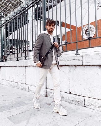 White Print Jeans Outfits For Men: A black and white houndstooth blazer and white print jeans are a great pairing to have in your off-duty styling rotation. Our favorite of a variety of ways to round off this outfit is white athletic shoes.