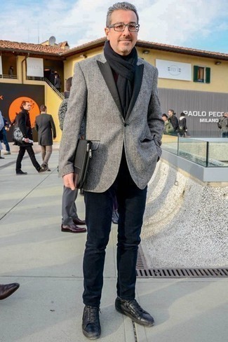 Black Canvas Zip Pouch Outfits For Men: A grey blazer and a black canvas zip pouch are the kind of a no-brainer off-duty outfit that you need when you have zero time. Play down the casualness of this getup by sporting a pair of black leather low top sneakers.