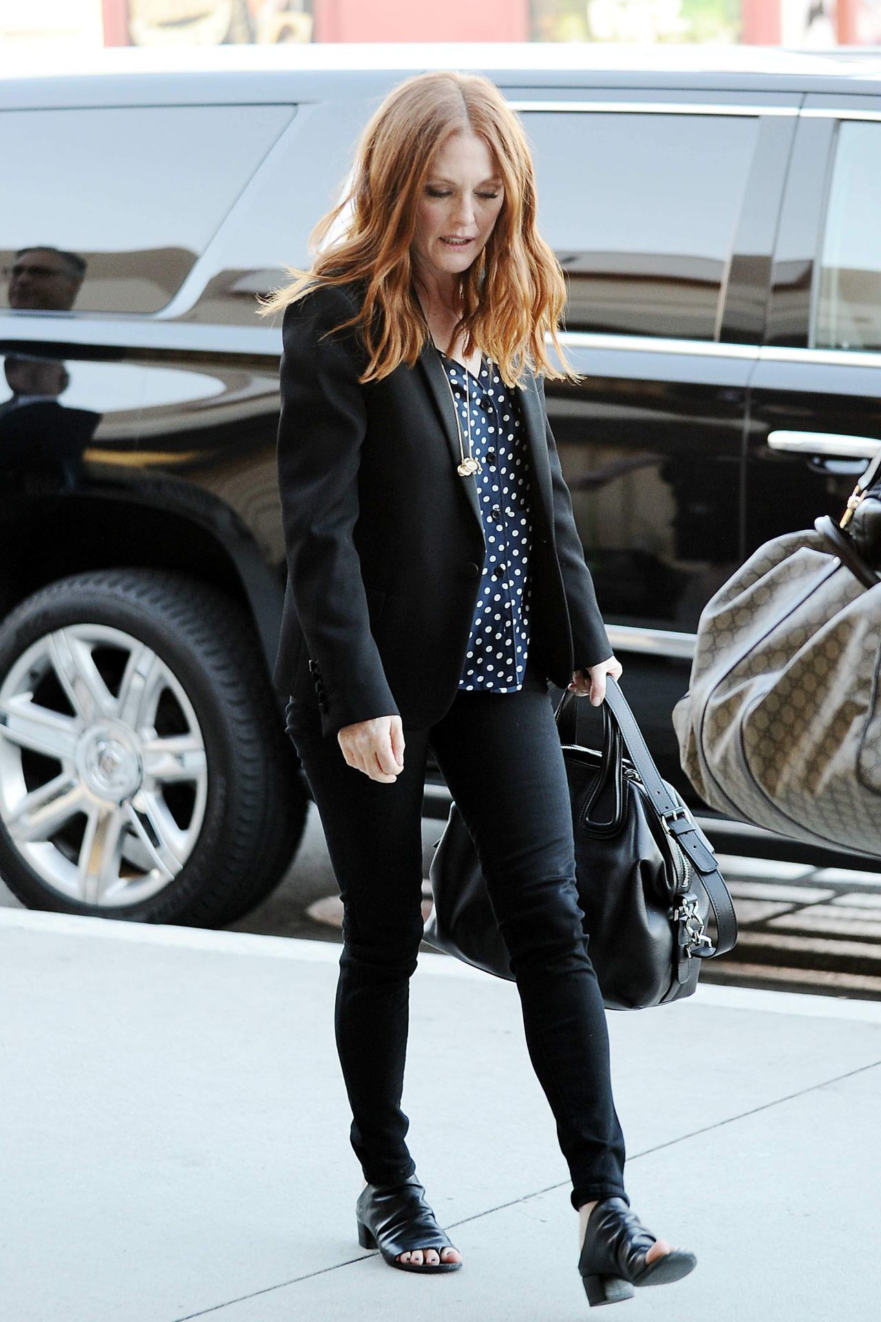 Black Balenciaga City bag and Swedish Hasbeens boots worn by Julianne Moore