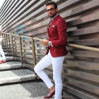 Red and Navy Gingham Long Sleeve Shirt Outfits For Men: This pairing of a red and navy gingham long sleeve shirt and white chinos is the ultimate laid-back style for any guy. Burgundy leather loafers are an effortless way to power up this ensemble.