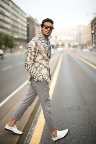 Beige Watch Outfits For Men: This urban combo of a beige houndstooth blazer and a beige watch is very easy to put together in no time flat, helping you look amazing and prepared for anything without spending a ton of time going through your closet. For a more refined vibe, complement your outfit with white leather low top sneakers.